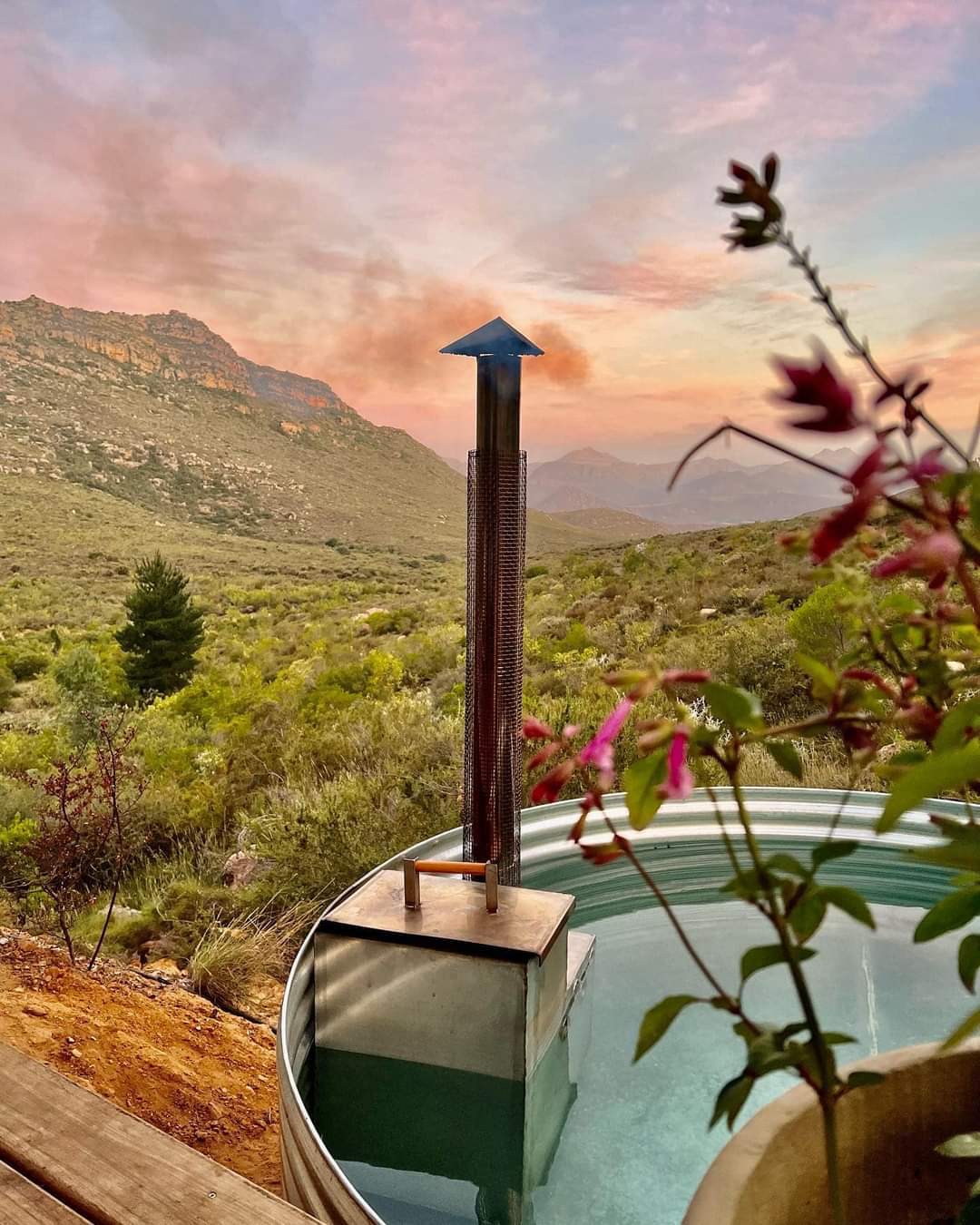 Wood-fired hot tub with mountain views